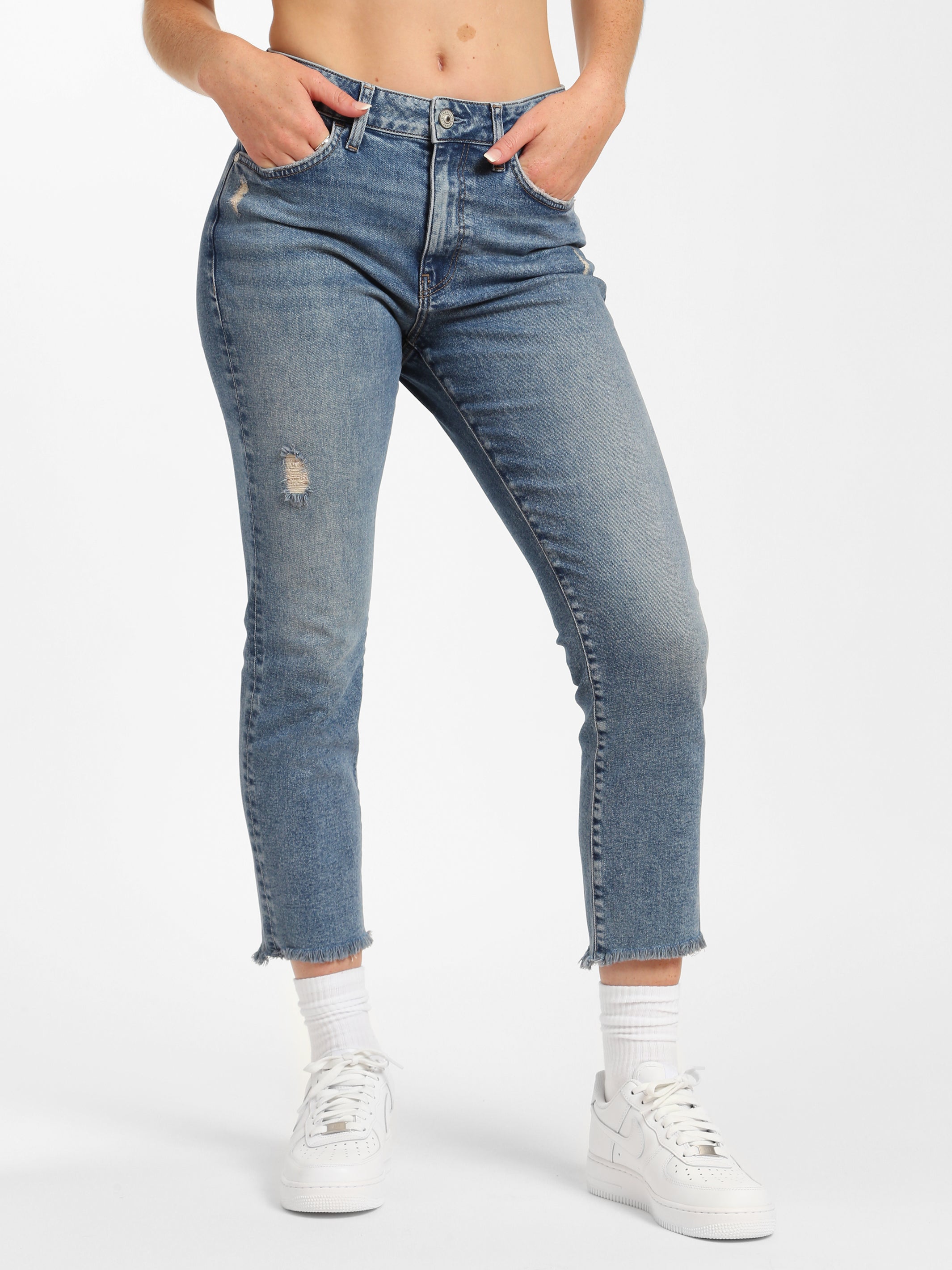 Calvin Klein Jeans high rise straight with rips in mid wash