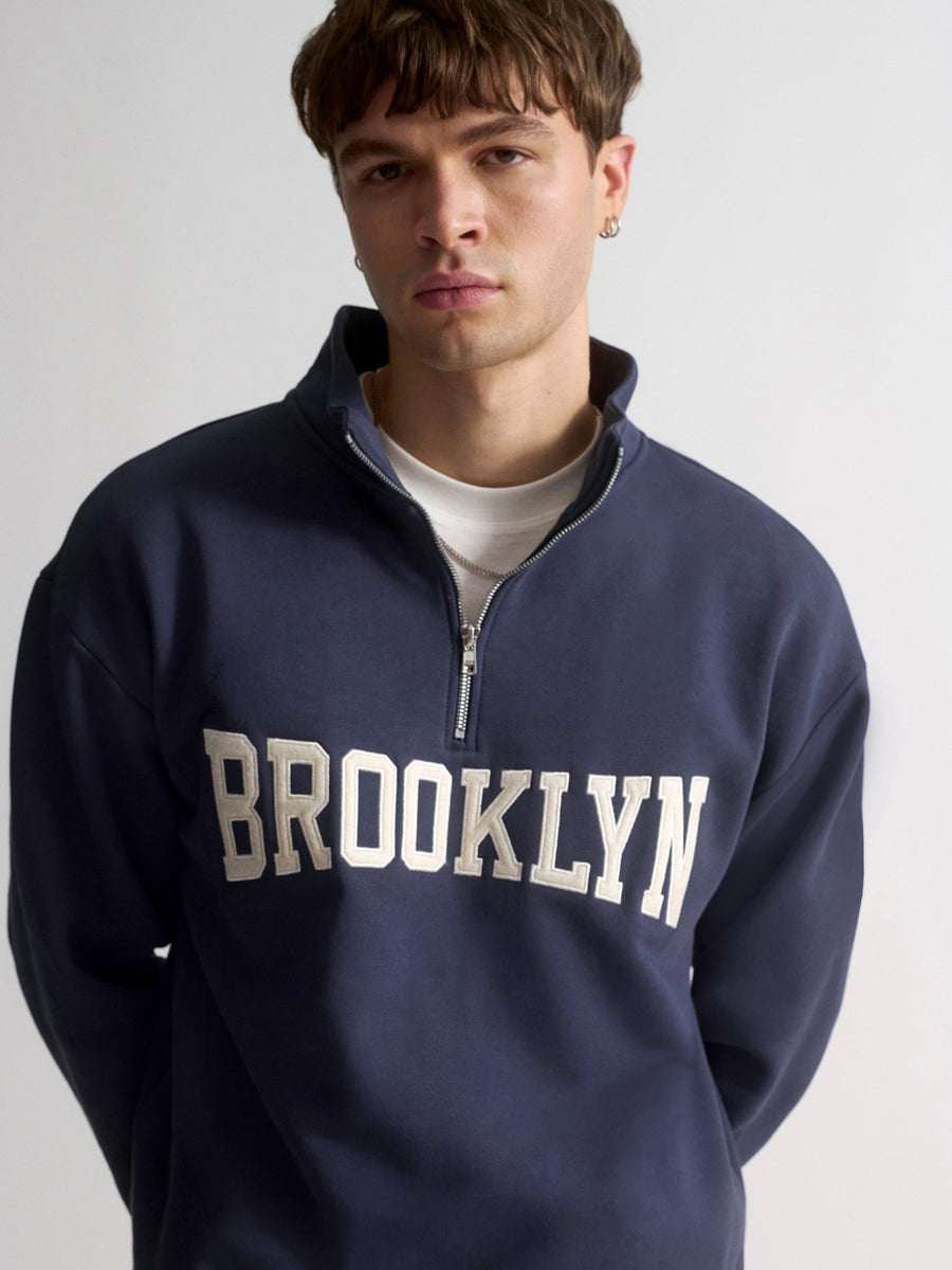 Men's Brooklyn Campus Half-Zip Sweatshirt In Mood Indigo - BROOKLYN INDUSTRIES