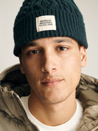 BKI Cable-Knit Beanie in Ponderosa Pine - BROOKLYN INDUSTRIES