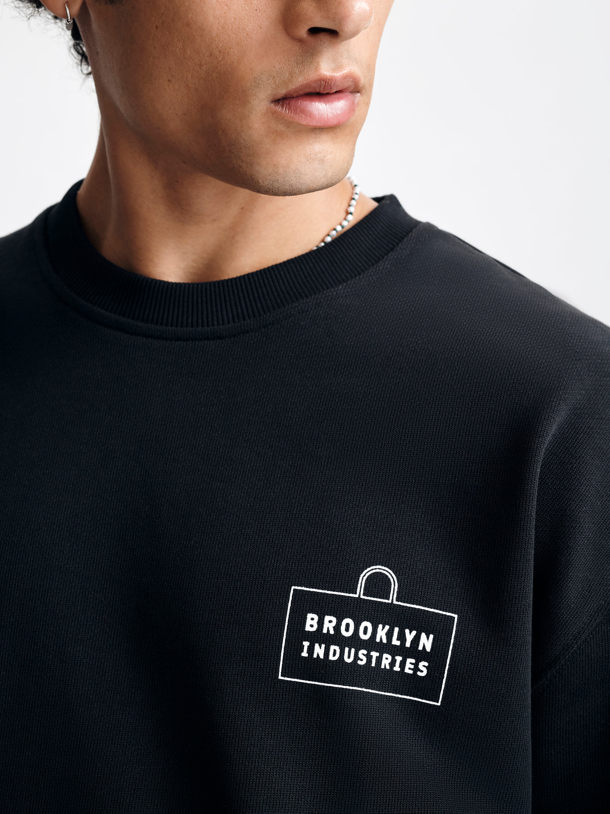 Men's City Rhythm Sweatshirt in Black - BROOKLYN INDUSTRIES
