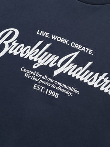 Women's BKI 1998 Crew Neck Sweatshirt In Total Eclipse - BROOKLYN INDUSTRIES