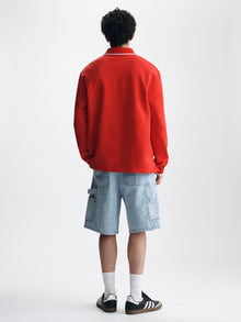 Men's Logo Varsity Polo Sweatshirt in Goji Berry - BROOKLYN INDUSTRIES