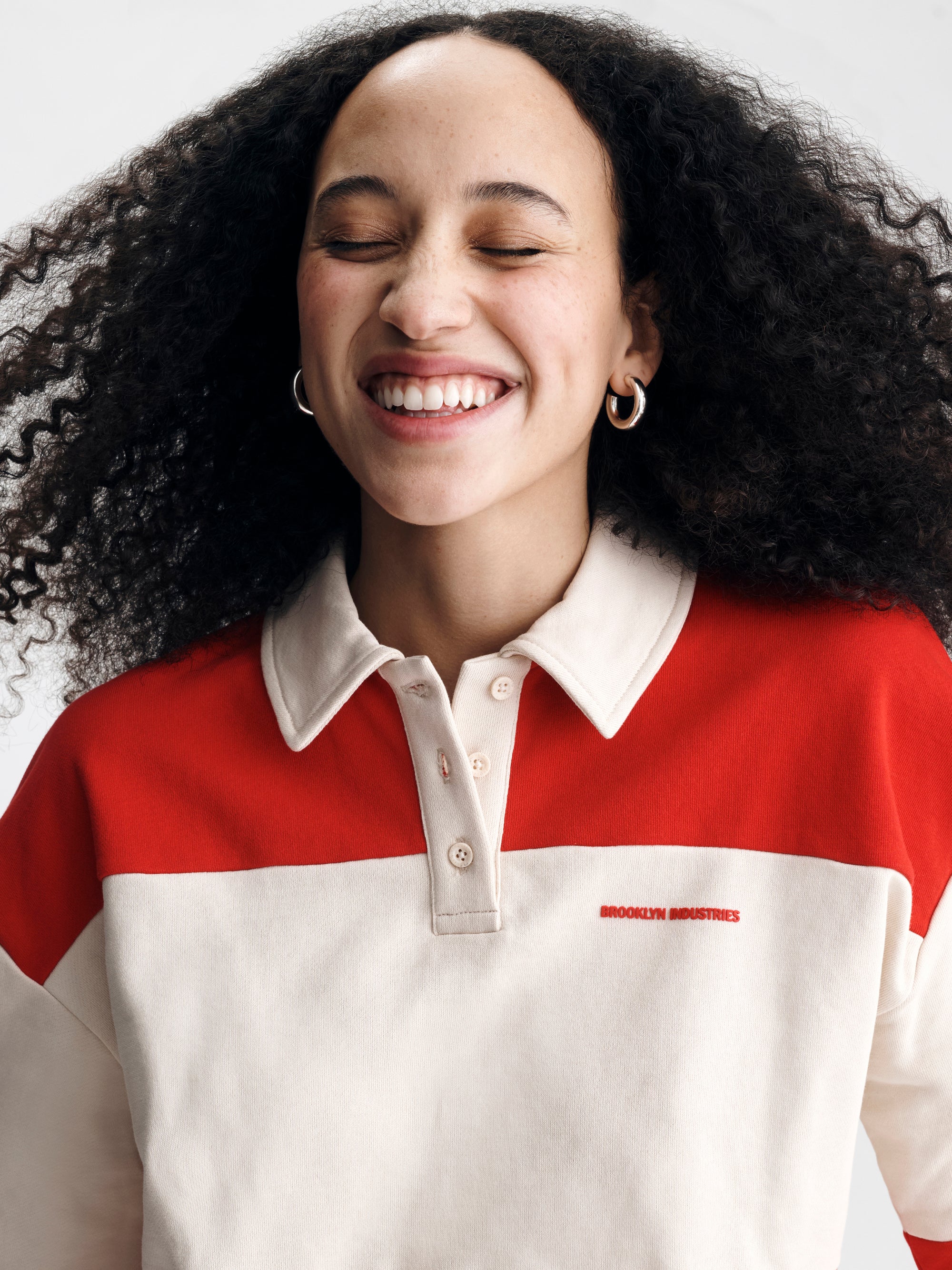 Women's Logo Rugby Polo Sweatshirt in Goji Berry - BROOKLYN INDUSTRIES