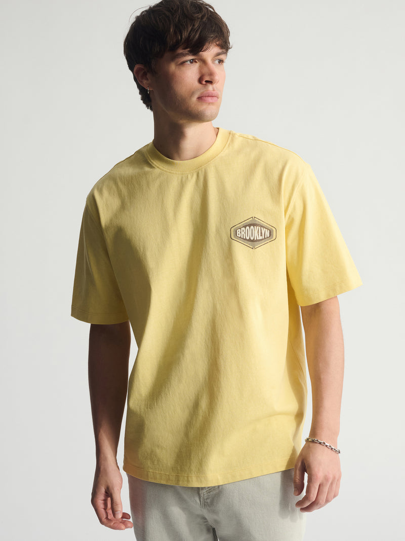 Men's Brooklyn Vintage Loose Fit T-Shirt In Dusky Citron - BROOKLYN INDUSTRIES